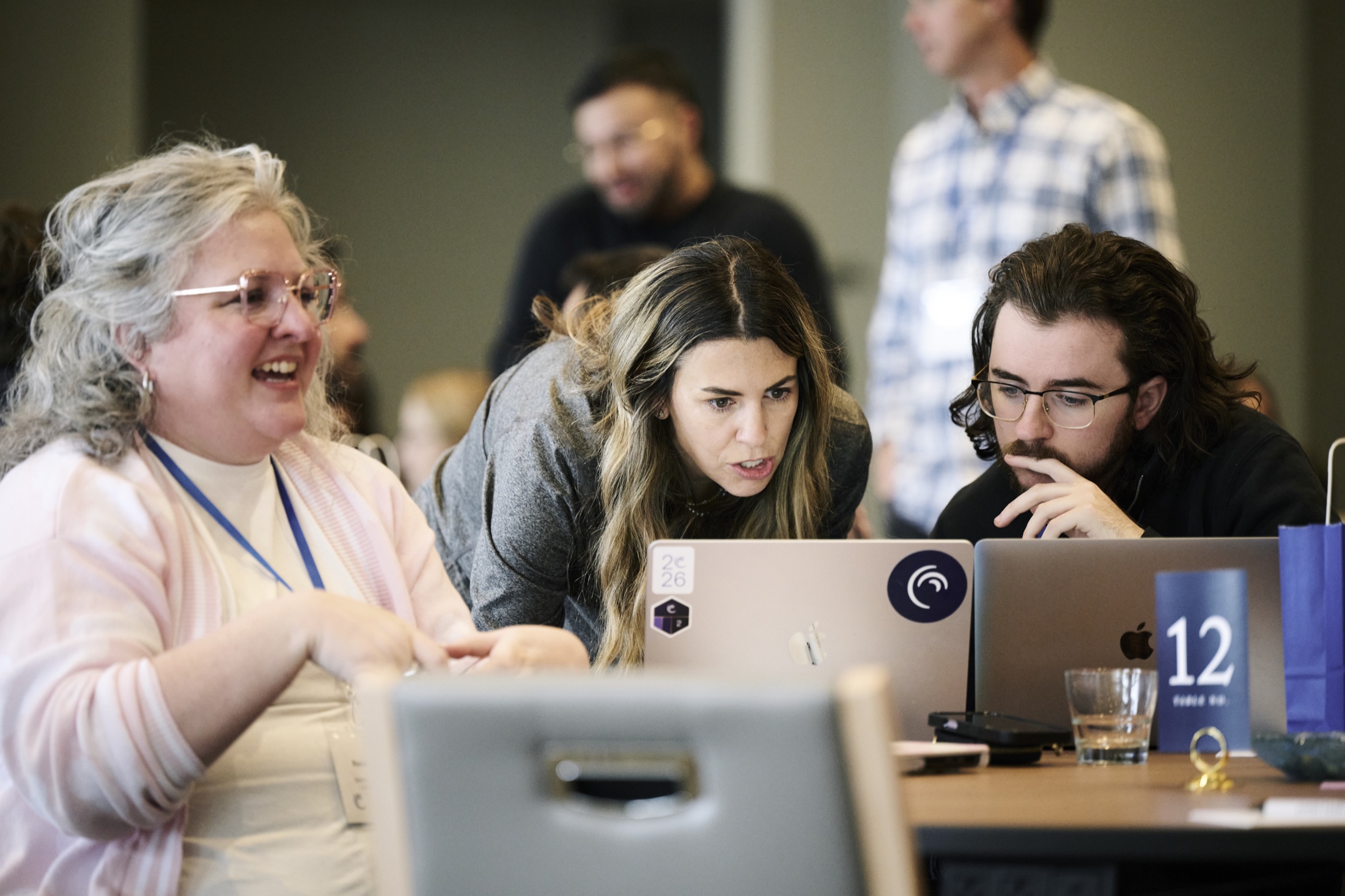 Cadence employees collaborating during an onsite working session